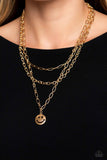 Winking Wanderer - Gold Paparazzi Necklace