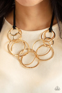 Spiraling Out of COUTURE - Gold Paparazzi Necklace - Leather