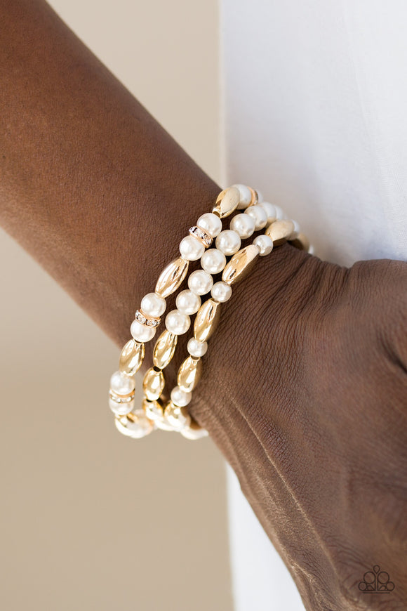 Chic Contender - Gold Paparazzi Bracelet