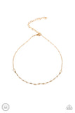 Take a Risk - Gold Paparazzi Choker Necklace